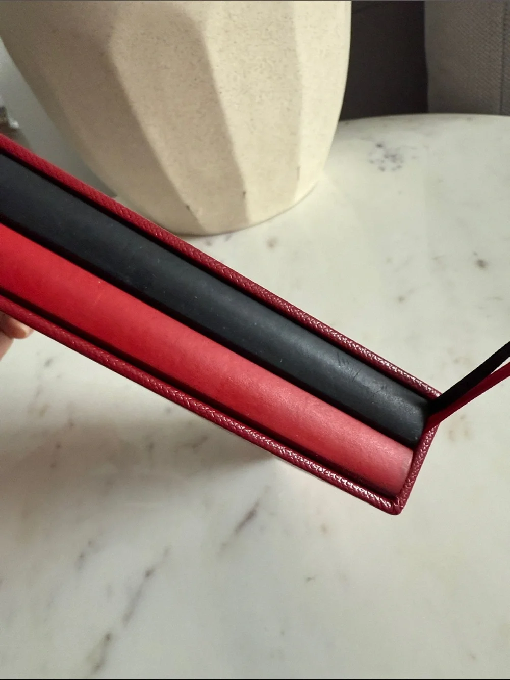 Cartier Red and Black Hardcover Notebooks with Gold Accents
